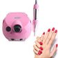 Pink nail drill machine with pink-and-silver pen handle and cord, with red manicured nails