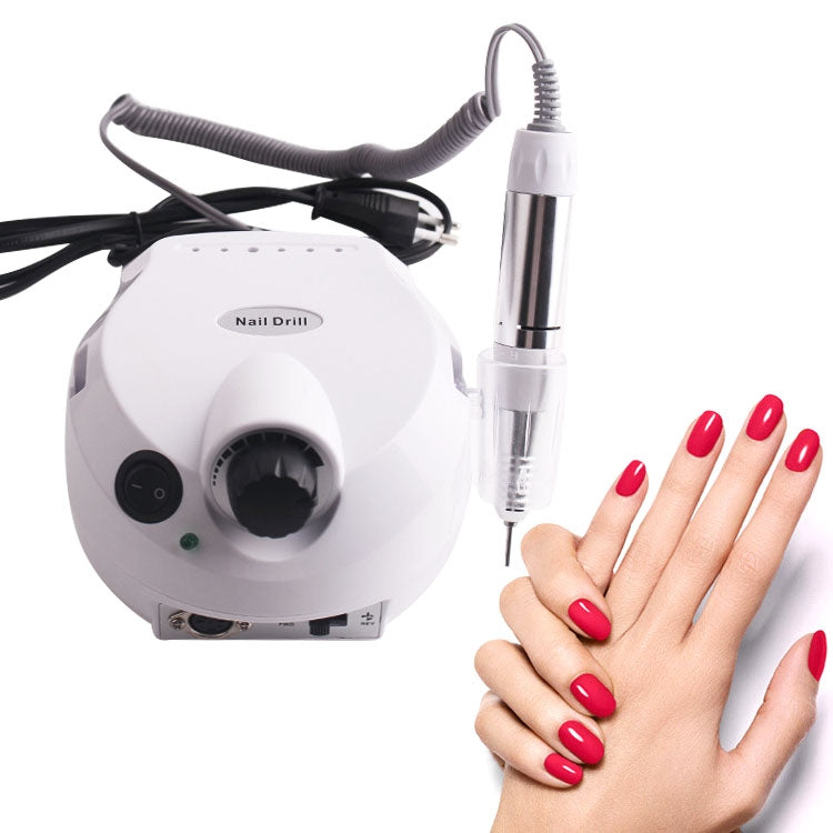 White electric nail drill base with connected handpiece and grinding bit