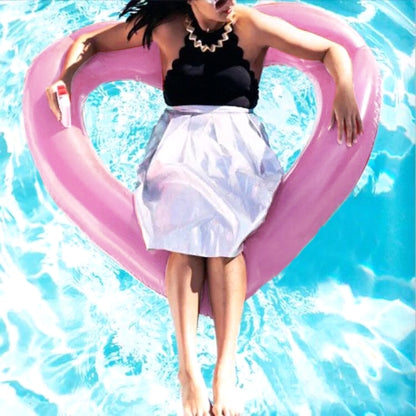 Pink heart-shaped inflatable pool safety ring, wide inner heart opening for floating