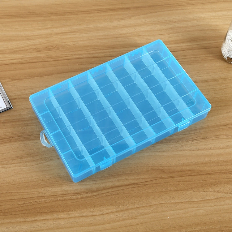 Blue translucent plastic organizer box with removable grid compartments for small items