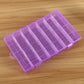 Purple translucent plastic organizer box with removable 28-slot grid compartments