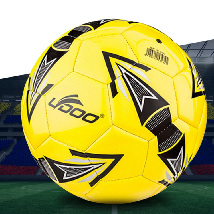 Fluorescent yellow PU soccer ball with black and white star-like graphics and seams.