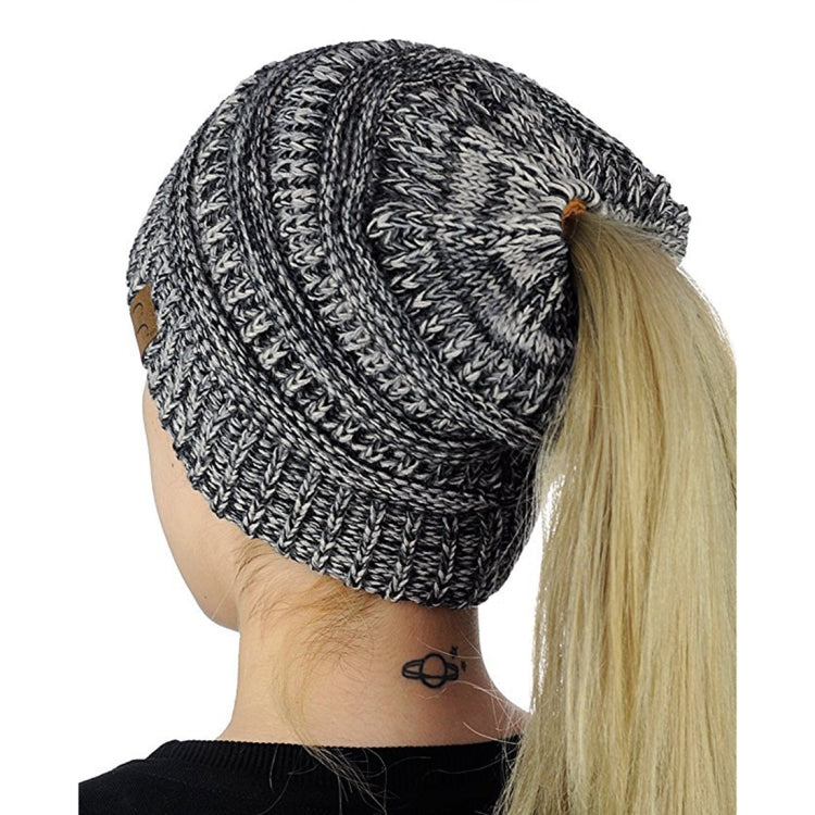 Black-and-grey marled knitted ponytail cap beanie with ribbed band
