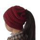 Burgundy knit ponytail beanie hat with ribbed brim and folded cuff