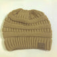 Ribbed knit ponytail beanie in brown with CC logo patch and back hair opening.