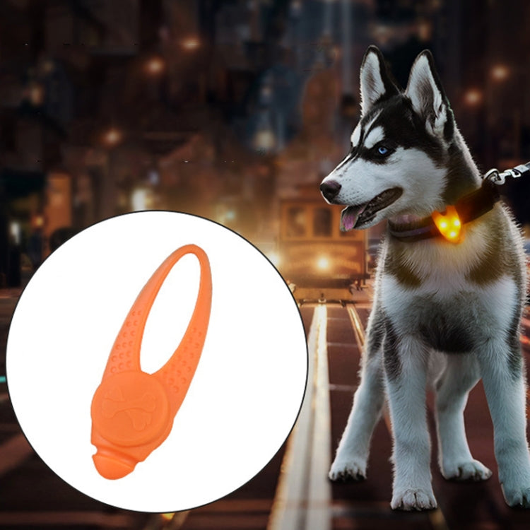 Pet safety LED pendant collar, orange glow on dog wearing silicone pendant