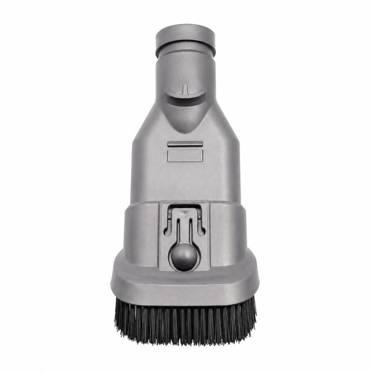 Vacuum brush head attachment with dense black bristles and side release tab
