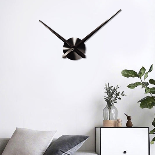 Black stainless steel wall clock with three-blade center and long hour and minute hands