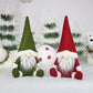 Pair of felt gnome window ornaments: green and red with white fur beards and hats