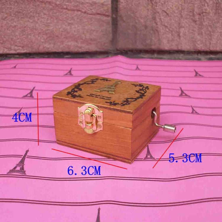 Wooden music box, 6.3 x 4 x 5.3 cm, engraved lid with pink lock