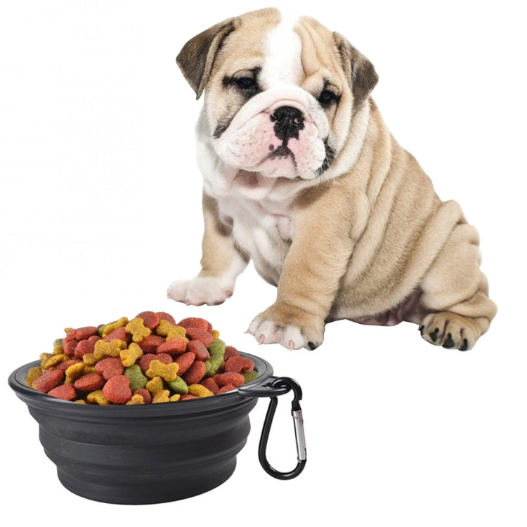 Foldable silicone pet bowl, black with kibble inside and metal clip handle