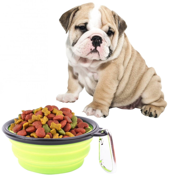 Foldable silicone pet bowl, neon green with kibble inside and metal clip handle