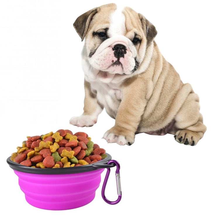 Foldable silicone pet bowl, magenta with kibble inside and purple metal clip