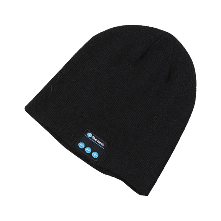 Black knitted beanie with small Bluetooth control panel patch on the front.