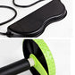 Black textured foot pad with black rope connection and green wheel detail