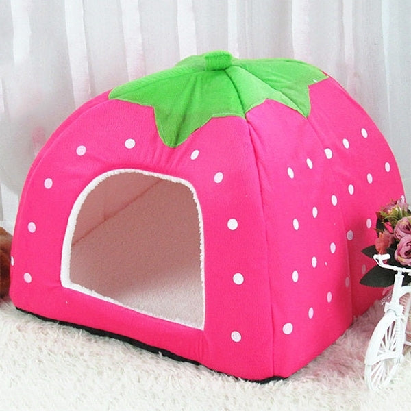 Pink strawberry-shaped foldable plush pet house nest with green leaf and front opening