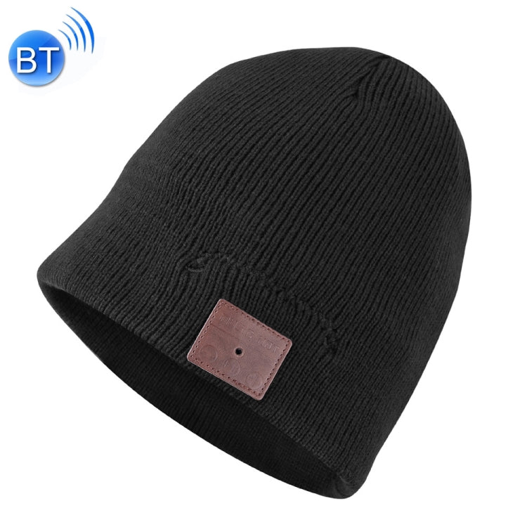 Black knit beanie with brown control patch on front