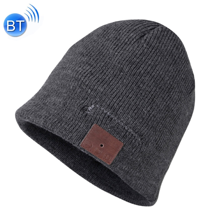 Dark gray knit beanie with brown control patch on front