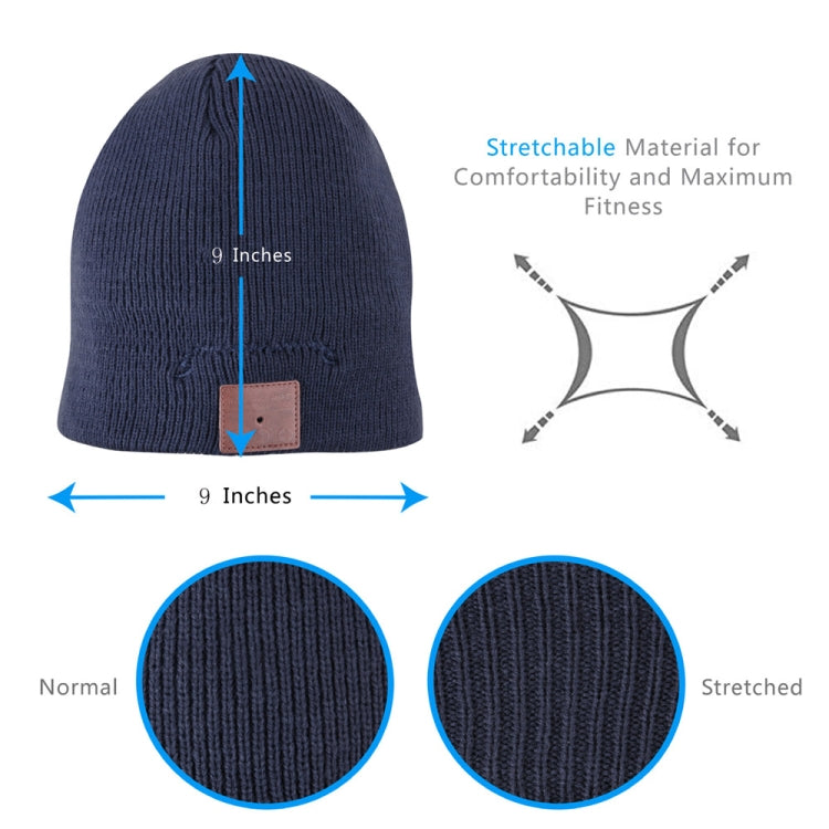 Navy blue knit beanie with brown control patch and textured ribbing detail