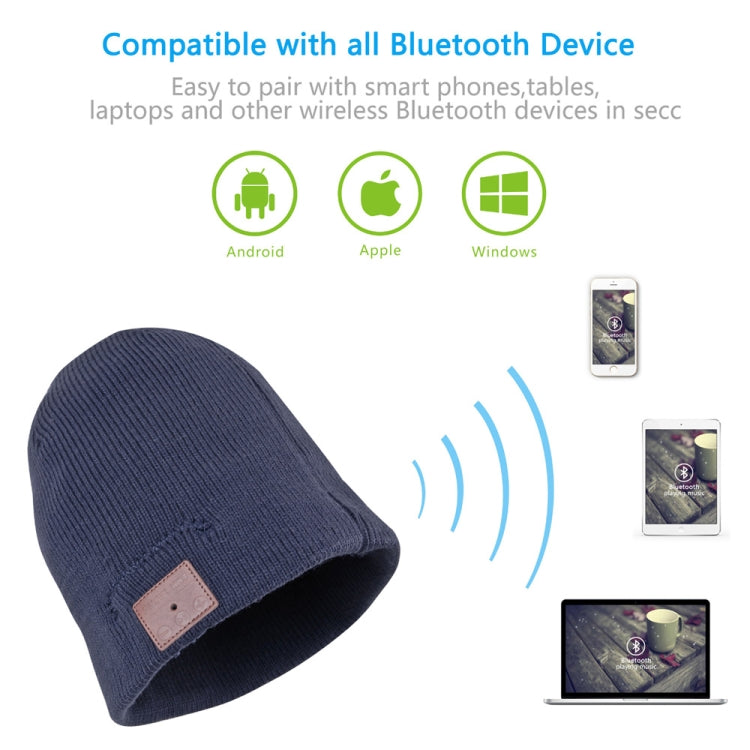 Navy blue knit beanie angled view with brown control patch