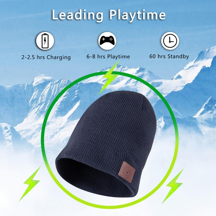 Navy blue knit beanie side view with brown control patch