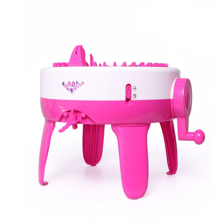 Pink and white tabletop knitting machine toy with handle and yarn guide