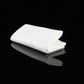 Folded white disposable cotton bath towel stack