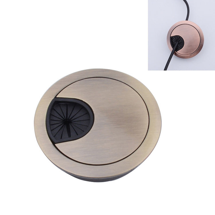 Round desk cable hole cover with brushed bronze finish and black insert