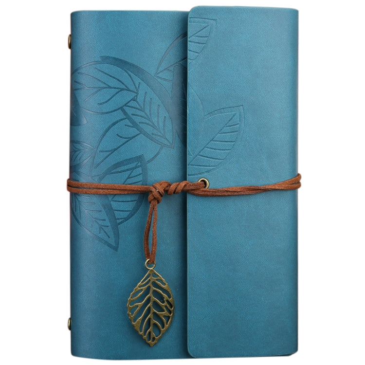 Blue faux-leather travel diary notebook with embossed leaf details and hanging leaf charm strap