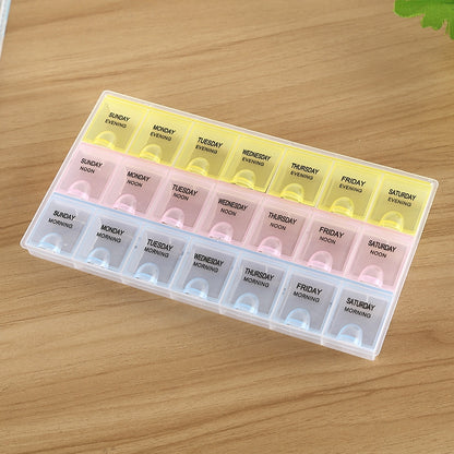 7-day pill organizer box with clear 21 compartments, color-coded morning and evening slots