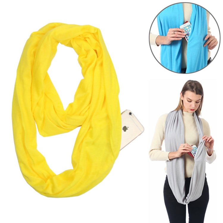 Yellow infinity scarf with zip pocket loop, wrapped for winter wear