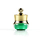 Gold travel container with green acrylic base and hard sealed lid