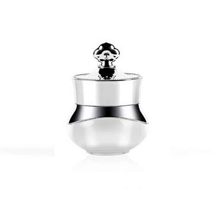 Silver travel container with clear acrylic body and hard sealed lid