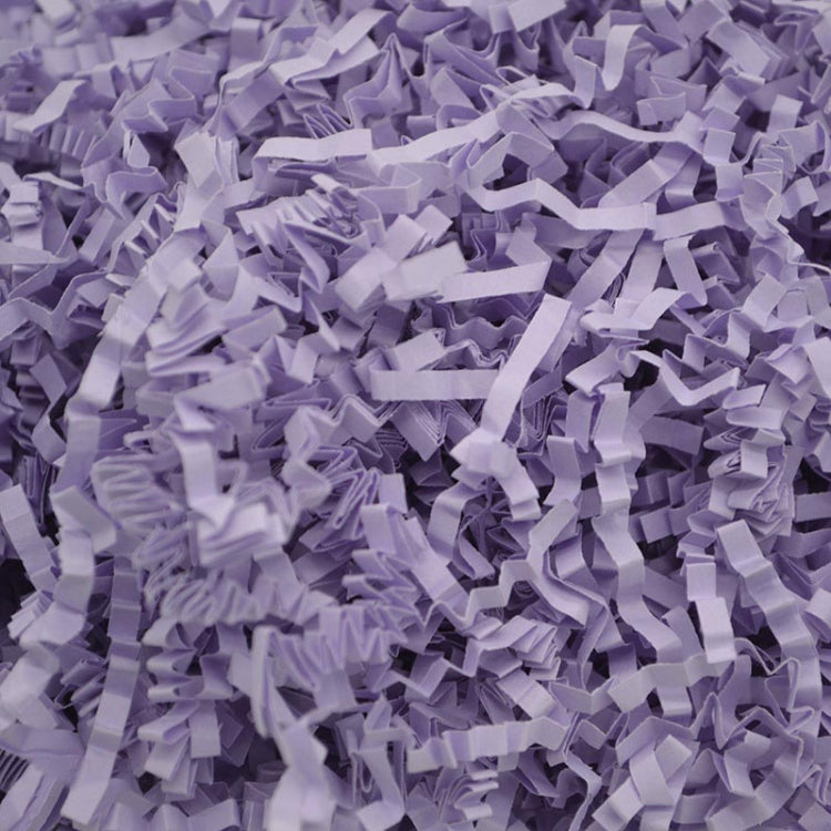 Lavender shredded paper filler strips with crumpled, ribbon-like paper pieces