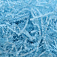 Light blue shredded paper filler strips, crumpled crinkle paper pieces
