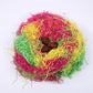 Multicolor shredded raffia paper filler nest with three brown round accents