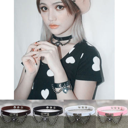 Black heart-lock leather choker with silver chain links and studded strap, worn