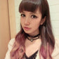 Heart-lock leather choker with silver chain links and heart charm, worn