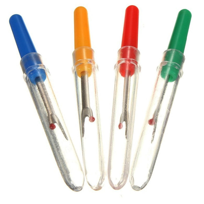 Seam ripper tools with blue, orange, red, and green plastic grips and metal blades