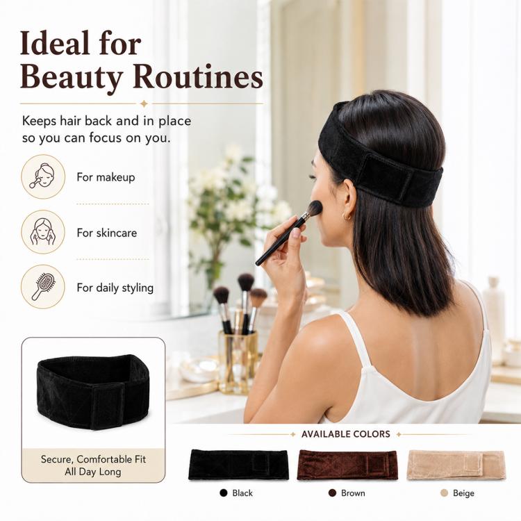 Black velvet headband holding hair back, wide band with stitched edges.