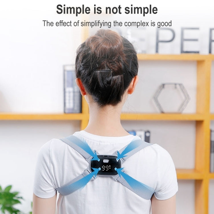 Light blue posture corrector worn on child’s back with black sensor module
