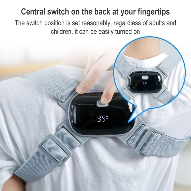 Close-up of light blue posture corrector with black sensor module adjusted by hand