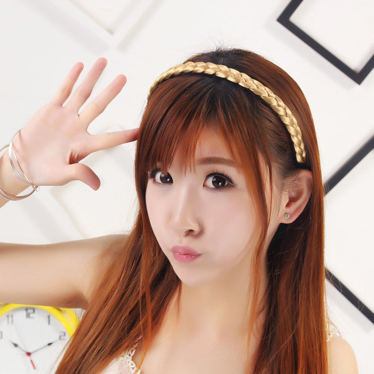 Light yellow braided twist hair headband on long hair