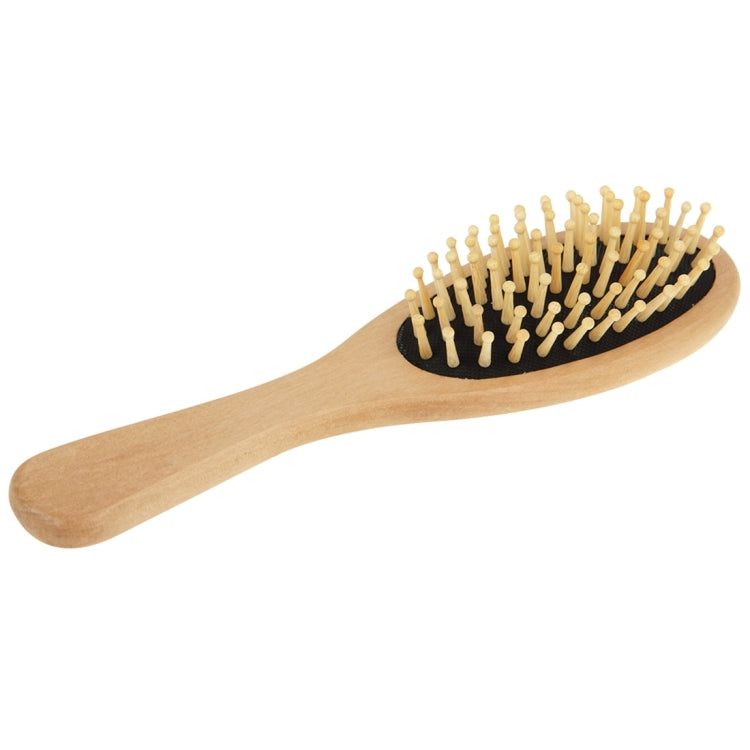 Medium wooden hair brush with black rubber base and straight wooden handle
