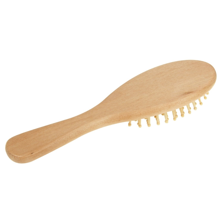 Medium wooden hair brush with long handle and fine wooden bristles