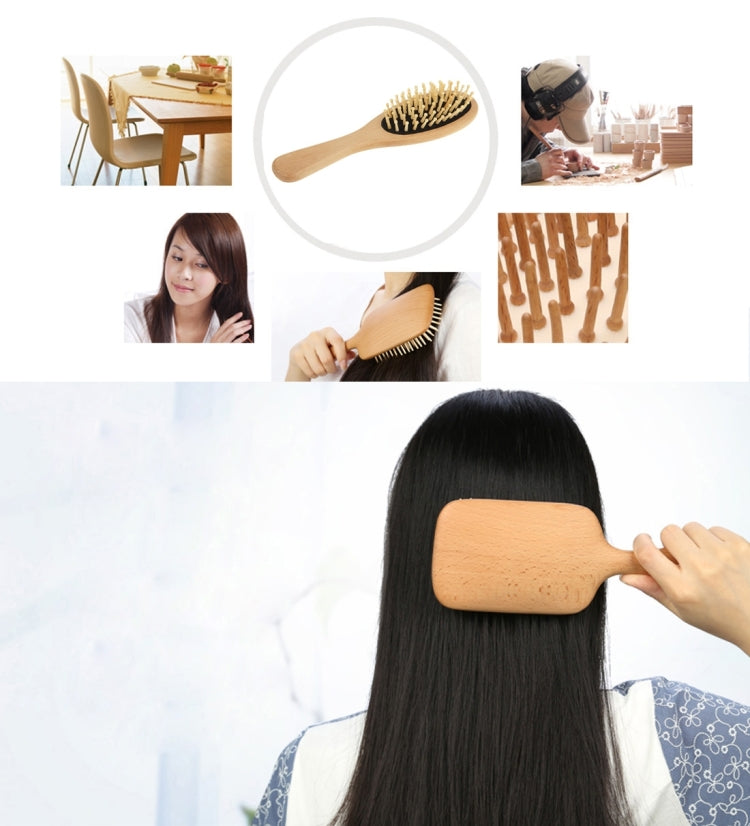 Wooden hair massage brush with black rubber base held against dark hair