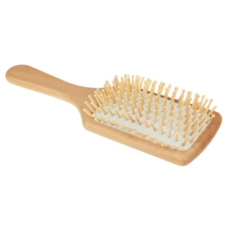 Large wooden massage hair comb with white rubber base and pin tips