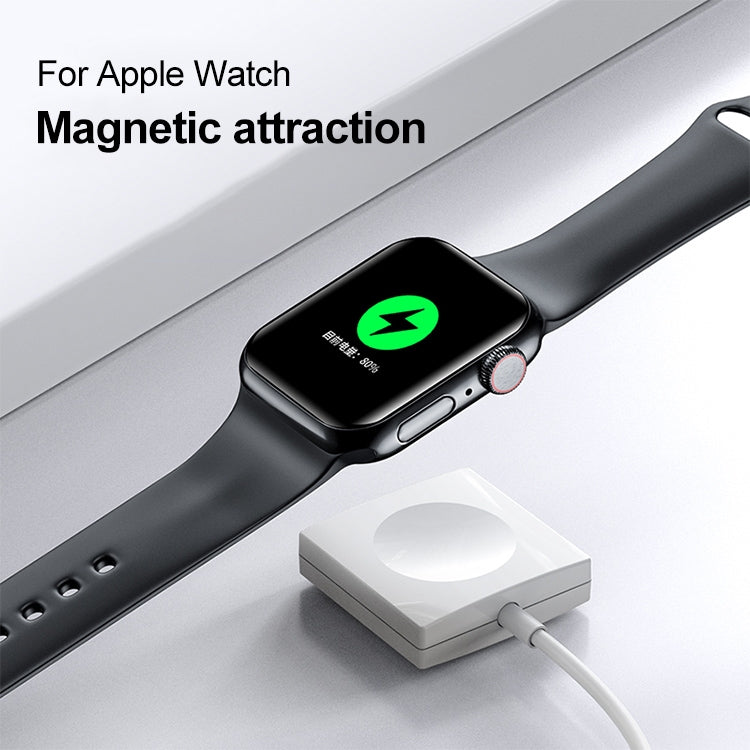 Black smartwatch charging with magnetic wireless charger dock and USB cable