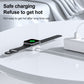 Smartwatch resting on white magnetic charging base with USB power cable