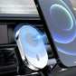 Magnetic car wireless charger bracket with silver frame and white pad glowing on vent